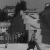 «Restoration of King George II returning to Greece (1946)» (στιγμιότυπο), 2014–15, Φιλμ 16 mm μεταφερμένο σε ψηφιακό βίντεο, ψηφιακό animation, ασπρόμαυρο, χωρίς ήχο, 34” σε λούπα